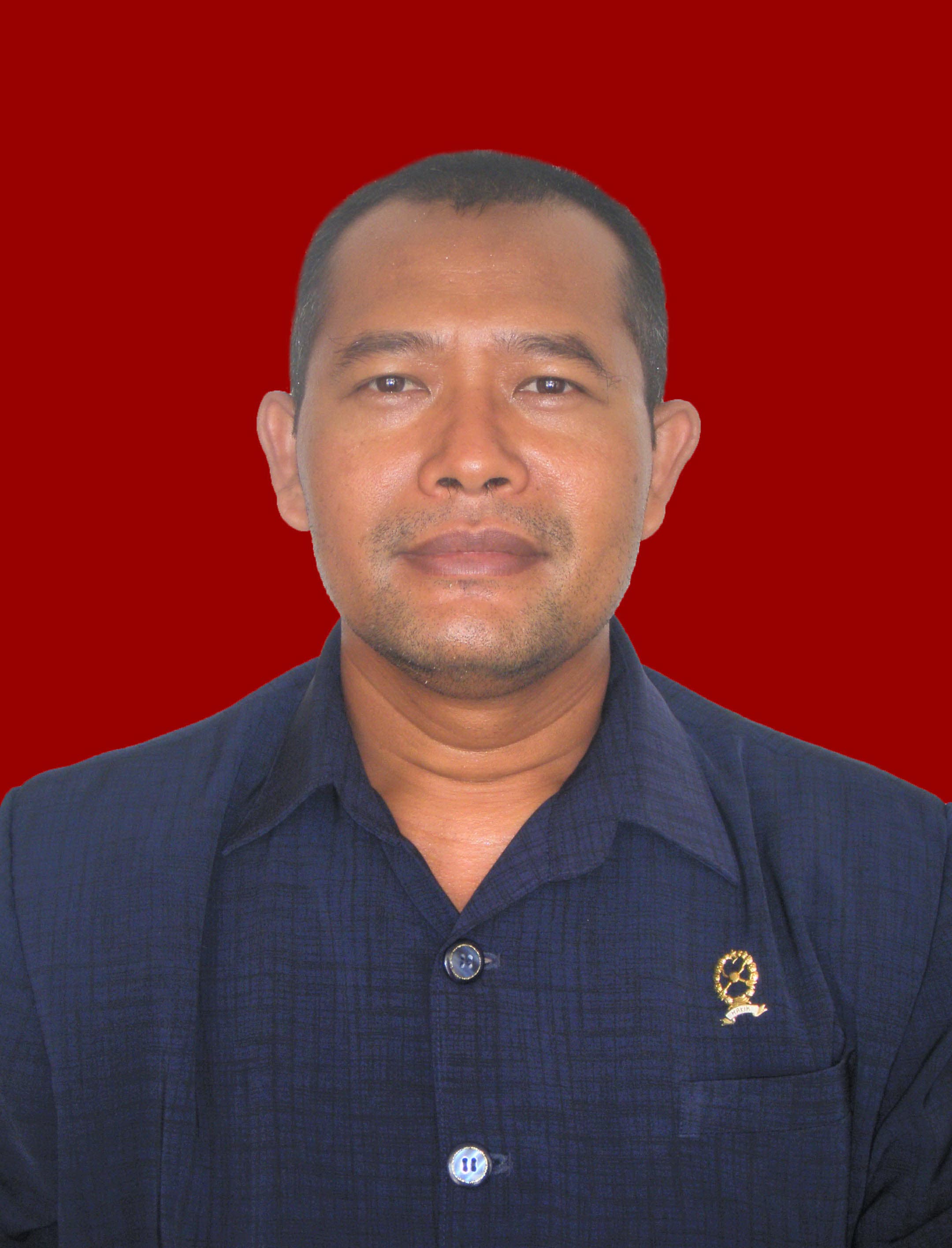 Drs. Masngaril Kirom, S.H., M.HES.